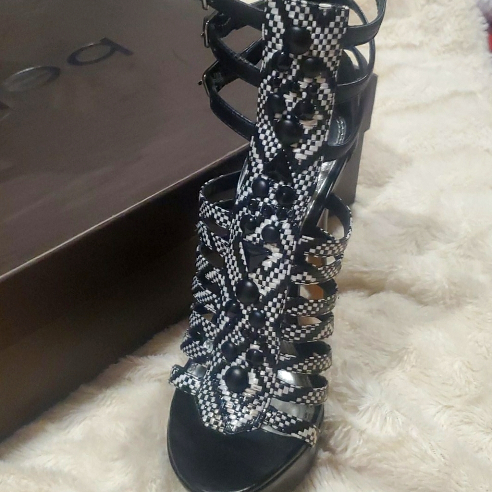 Strappy high heel platform sandals..